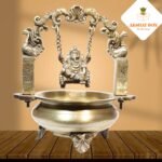 BRASS URLI WITH GANESHA HANGING IN CENTER